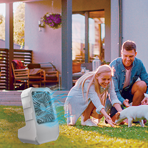 Arctic Air® Outdoor cooling off a family in the backyard